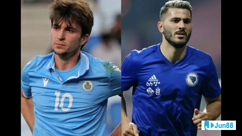 Cầu thủ Áo chạy vòng qua cầu thủ San Marino để tìm đường vào vòng cấm